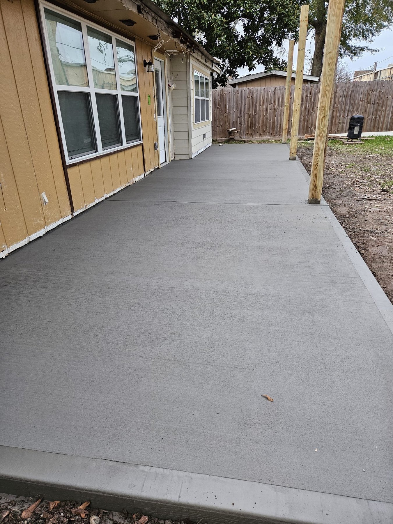 Completed concrete patio extension