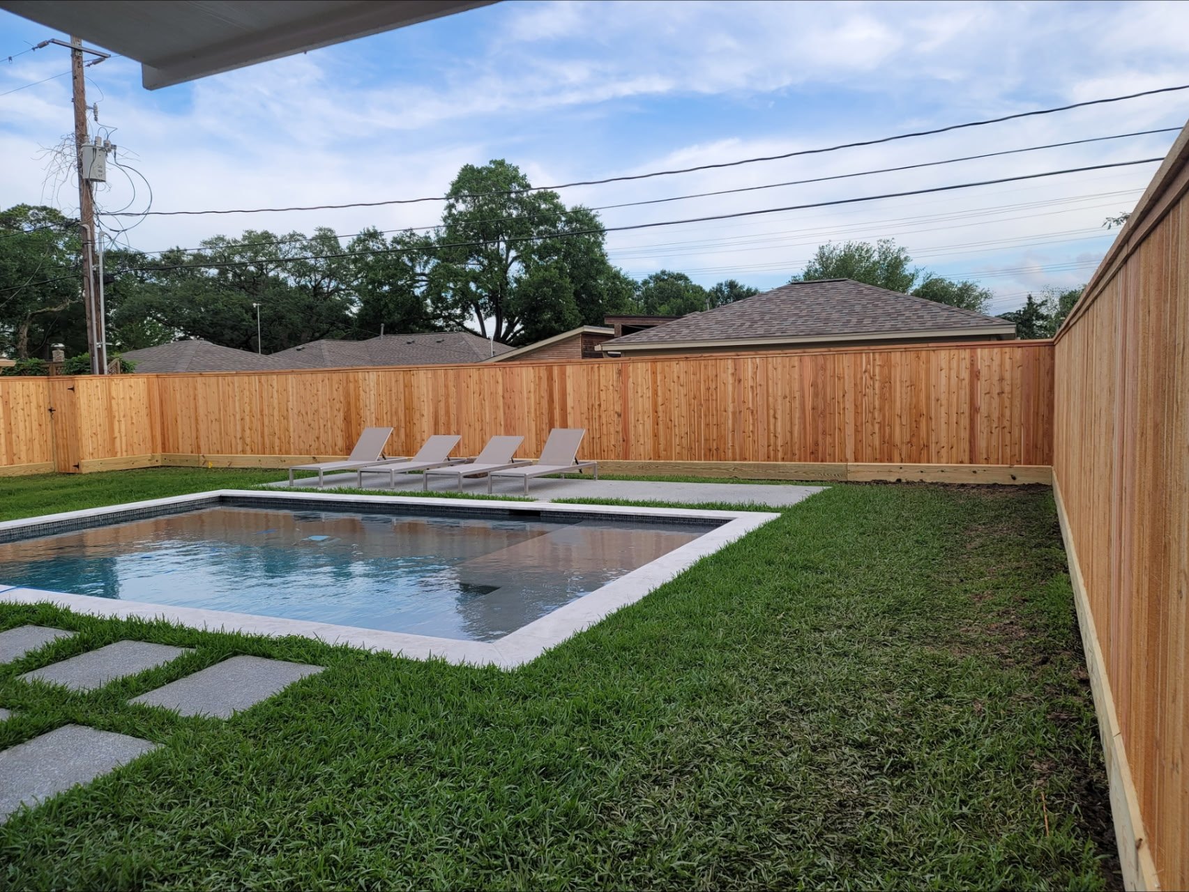 Fence around backyard pool